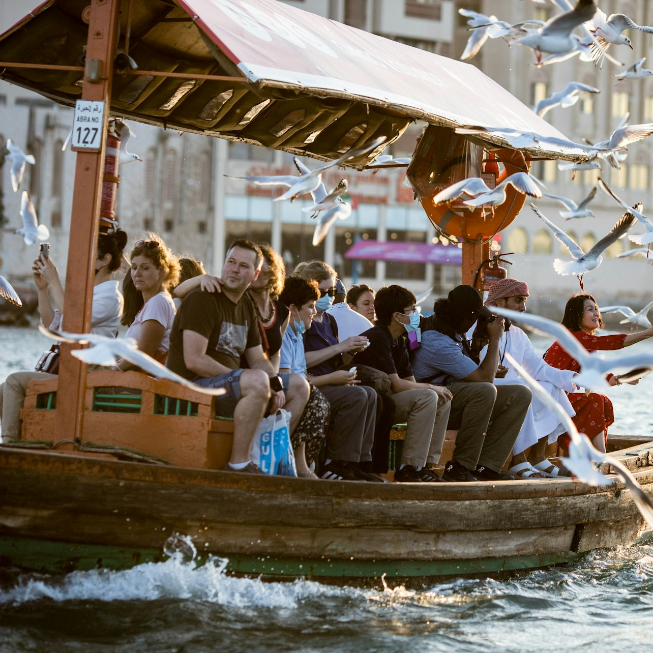 Experience the charm of Dubai Creek as you glide on a traditional Abra surrounded by the sights and sounds of a bustling city rich in culture and heritage.